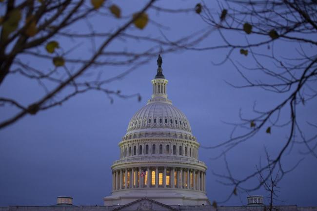 © Bloomberg. The U.S. Capitol building stands at dawn in Washington, D.C., U.S., on Saturday, Nov. 30, 2019. The House Intelligence Committee is preparing to release a scathing report alleging President Donald Trump engaged in a months-long effort to seek foreign interference in the 2020 election and obstruct a congressional investigation. Photographer: Stefani Reynolds/Bloomberg