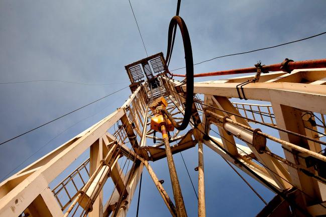 © Bloomberg. An oilrig operated by the Chinese company Zhongyuan Petroleum Exploration Bureau (ZPEB) is seen near Melut, in the Upper Nile, Sudan, on Monday, Nov. 29, 2010.  Photographer: Trevor Snapp/Bloomberg