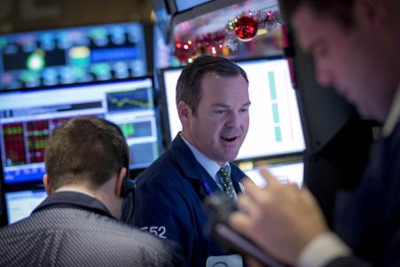 © Reuters/Brendan McDermid. The Dow Jones Industrial Average jumped over 75 points in early trading Monday as economists look ahead to a series of economic data this week that could push U.S. stocks into a 'Santa Claus rally' by year-end.