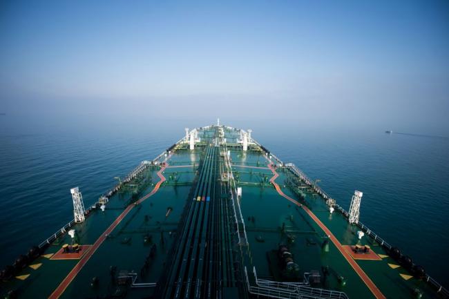 © Bloomberg. The crude oil tanker 'Devon' sails through the Persian Gulf towards Kharq Island to transport crude oil to export markets in the Persian Gulf, Iran, on Friday, March 23, 2018. Geopolitical risk is creeping back into the crude oil market. Photographer: Bloomberg/Bloomberg