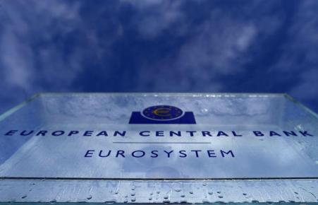 © Reuters/Kai Pfaffenbach. Water droplets from melting ice are seen on the entrance sign of the new European Central Bank (ECB) headquarters in Frankfurt January 21, 2015.