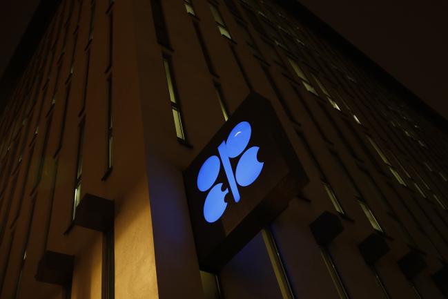 © Bloomberg. An OPEC sign hangs outside the OPEC Secretariat as night falls during the 175th Organization Of Petroleum Exporting Countries (OPEC) meeting in Vienna, Austria, on Thursday, Dec. 6, 2018. The Organization of Petroleum Exporting Countries and its allies are desperate to shore up oil prices after a slump of more than $20 a barrel since October. Photographer: Stefan Wermuth/Bloomberg