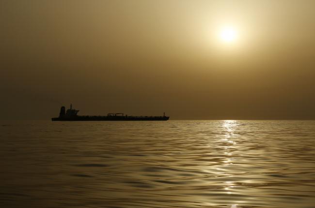 © Bloomberg. An oil tanker in the ocean. Photographer: Marcelo del Pozo/Bloomberg