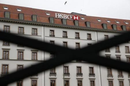 © Reuters/Denis Balibouse. A HSBC logo is pictured at a Swiss branch of the bank in Geneva on Feb. 18, 2015.