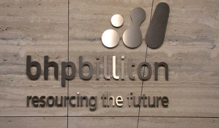© Getty Images/MAL FAIRCLOUGH/AFP. BHP Billiton Limited, the world's largest mining company by market value, reported a staggering 86 percent drop in annual profits for the year ended June 30. Pictured: BHP Billiton signage at the BHP Business centre in Melbourne on Feb. 18, 2014.