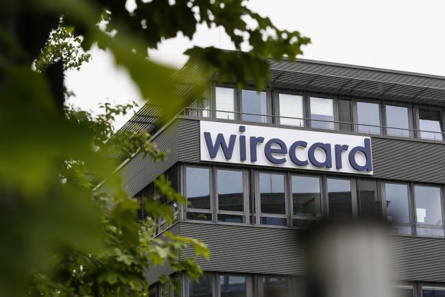© Bloomberg. The Wirecard AG headquarters stand in the Aschheim district of Munich, Germany, on Friday, June 19, 2020. Wirecard shares continued their free-fall after the two Asian banks that were supposed to be holding 1.9 billion euros ($2.1 billion) of missing cash denied any business relationship with the German payments company. Photographer: Michaela Handrek-Rehle/Bloomberg