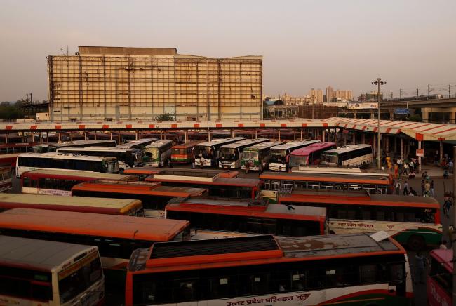 © Bloomberg. Buses parked at a station in New Delhi, India, on Tuesday, April 20.