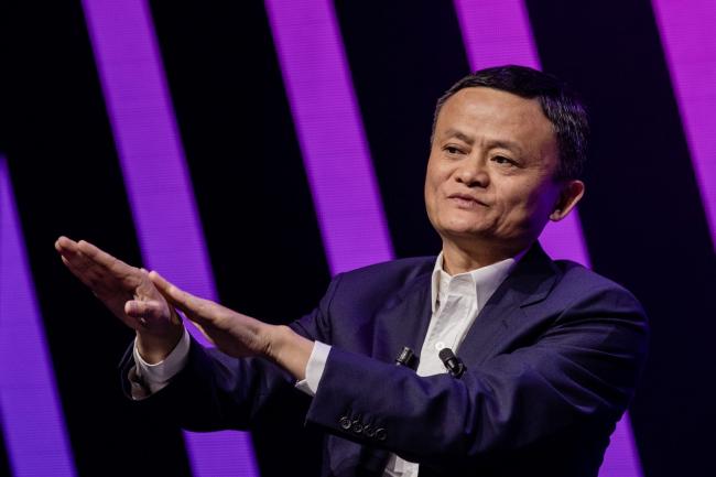 © Bloomberg. Jack Ma, chairman of Alibaba Group Holding Ltd., left, gestures while speaking during a fireside interview at the Viva Technology conference in Paris, France, on Thursday, May 16, 2019. Donald Trump’s latest offensive against China’s Huawei Technologies Co. puts Europe in an even bigger bind over which side to pick, but France's President Emmanuel Macron is holding the line.