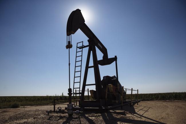 © Bloomberg. A pump jack operates near Hugoton, Kansas, U.S., on Friday, Sept. 25, 2020. After all the trauma the U.S. oil industry has been through this year -- from production cuts to mass layoffs and a string of bankruptcies -- many producers say they’re still prioritizing output over reducing debt. Photographer: Angus Mordant/Bloomberg