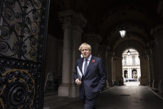 © Bloomberg. Boris Johnson, U.K. prime minister, departs following a weekly meeting of cabinet ministers in London, U.K., on Tuesday, Nov. 10, 2020. The U.K.'s House of Lords rejected government plans to break international law over Brexit, putting the onus back on Prime Minister Boris Johnson, who immediately vowed to push ahead with the legislation.