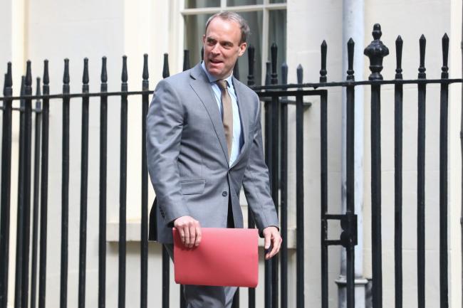 © Bloomberg. Dominic Raab, U.K. foreign secretary, arrives at number 10 Downing Street in London, U.K., on Monday, April 27, 2020. U.K. Prime Minister BorisJohnson is back at work to lead the U.K.'s efforts to tackle the coronavirus, amid calls to ease the lockdown that has brought swathes of the economy to a standstill. Photographer: Simon Dawson/Bloomberg