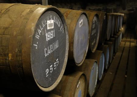 © Reuters/Russell Cheyne. Diageo plc is reportedly being considered for a buyout by Brazilian billionaire Jorge Paulo Lemann. In this photo, whisky barrels are seen in the warehouse of the Diageo Cardhu distillery in Scotland on March 21, 2014.