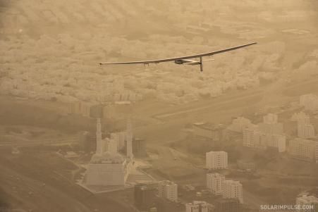 © Solar Impulse. The Solar Impulse 2 aircraft is seeing flying over Muscat, Oman, on March 10, 2015. The aircraft, which is powered only by solar panels and batteries, is set to land on U.S. soil this spring.