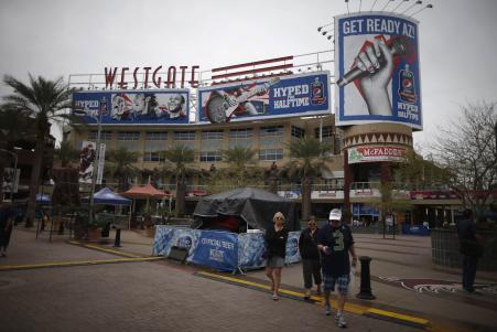 © Reuters/Lucy Nicholson. A sign for the Westgate shopping mall is seen near the University of Phoenix Stadium, where Super Bowl XLIX will be played in Glendale, Arizona, Jan. 29, 2015. During the past decade or so, this city of 230,000 on Phoenix's northwestern border, has reinvented itself from farm town to sports mecca. But Glendale's love of sports has come at a cost: red ink and jobs lost. All told, says Glendale Mayor Jerry Weiers, the town's sports fetish has produced 'a house of cards.'