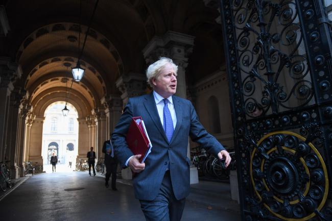 © Bloomberg. Boris Johnson departs from a meeting of cabinet ministers in London on Sept. 15.