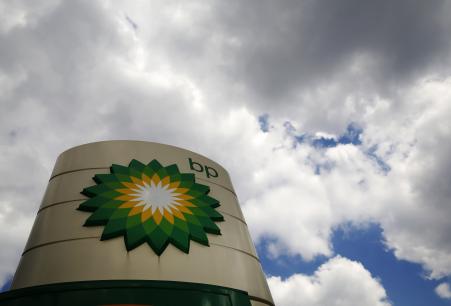 © Reuters/Luke MacGregor. Signage for a BP petrol station is pictured in London, July 29, 2014.