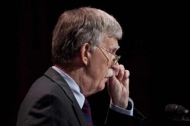 © Bloomberg. John Bolton, national security adviser, adjusts his glasses while speaking during the Christians United For Israel (CUFI) Washington summit in Washington, D.C., U.S., on Monday, July 8, 2019. Bolton last month said the U.S. would like to see Iranian forces leave Syria as part of a broader withdrawal from foreign territory, after a meeting with his Russian and Israeli counterparts. Photographer: Andrew Harrer/Bloomberg