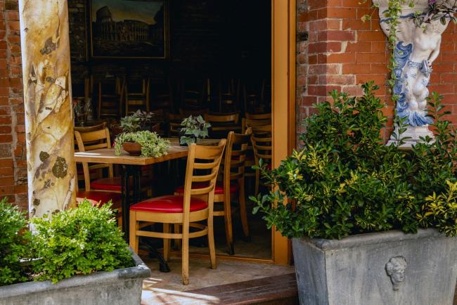 © Bloomberg. An inside dining area of a restaurants stands empty in the Little Italy neighborhood of New York. Photographer: George Etheredge/Bloomberg