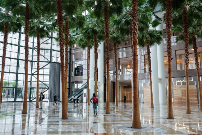 © Bloomberg. Pedestrians walk through Brookfield Place shopping center in New York on June 10. Photographer: Sarah Blesener/Bloomberg