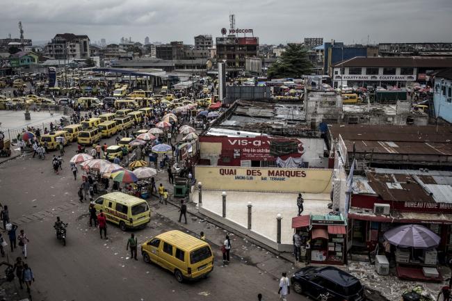 © Bloomberg. Yellow taxi van vehicles line the streets in the Victoire district of Kinshasa, Democratic Republic of the Congo, on Friday, Jan. 11, 2019. The disputed presidential election result could lead to legal challenges and a prolonged period of political uncertainty -- the last thing that's needed in a nation already confronting rampant poverty and insecurity. Photographer: John Wessels/Bloomberg