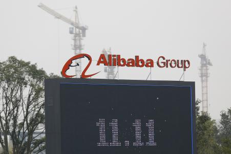 © Reuters/Aly Song. The logo of the Alibaba Group is seen inside the company's headquarters in Hangzhou, Zhejiang province, Nov. 11, 2014.