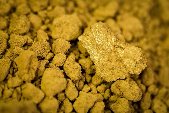 © Bloomberg. Pure gold precipitate sits in a container at the Uralelectromed Copper Refinery, operated by Ural Mining and Metallurgical Co. (UMMC), in Verkhnyaya Pyshma, Russia, on Thursday, July 30, 2020. Gold surged to a fresh record Friday fueled by a weaker dollar and low interest rates. Silver headed for its best month since 1979. Photographer: Andrey Rudakov/Bloomberg