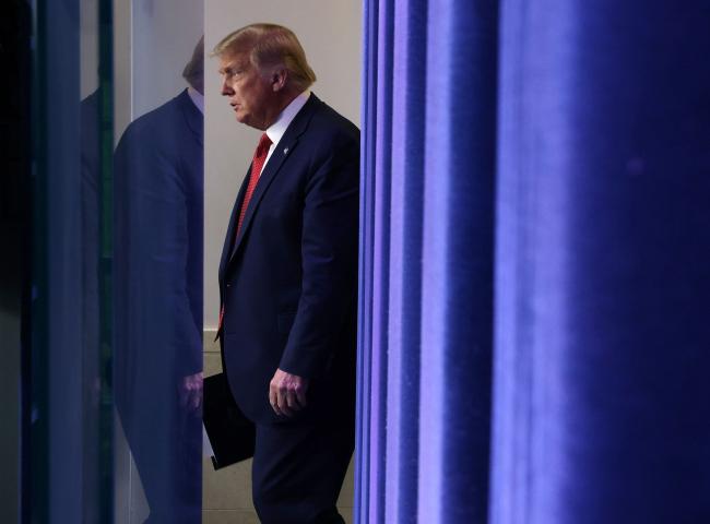 © Bloomberg. WASHINGTON, DC - AUGUST 10: U.S. President Donald Trump walks up to speak during a news conference at the James Brady Press Briefing Room of the White House August 10, 2020 in Washington, DC. President Trump tweeted earlier today that he will accept the Republican presidential nomination on August 27 either at the Civil War battlefield in Gettysburg, Pennsylvania, or at the White House. (Photo by Alex Wong/Getty Images)