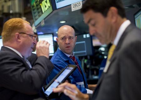 © Reuters/Brendan McDermid. Traders work on the floor of the New York Stock Exchange, Sept. 8, 2015.