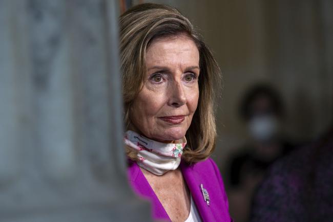 © Bloomberg. U.S. House Speaker Nancy Pelosi, a Democrat from California, waits for a television interview at the Russell Senate Office Building on Capitol Hill in Washington, D.C., U.S., on Tuesday, Aug. 11, 2020. President Donald Trump's weekend set of executive actions aimed at shoring up the U.S. economy while stimulus talks remain stalled in Congress seems to have done little to add urgency to the negotiations.