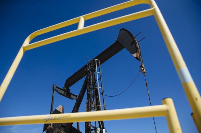 © Bloomberg. A pump jack operates near Stratford, Texas, U.S., on Saturday, Sept. 26, 2020. After all the trauma the U.S. oil industry has been through this year -- from production cuts to mass layoffs and a string of bankruptcies -- many producers say they’re still prioritizing output over reducing debt. Photographer: Angus Mordant/Bloomberg