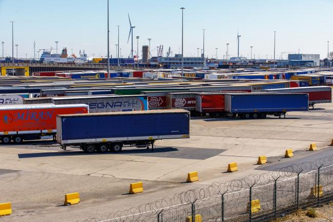 © Bloomberg. Haulage truck trailers stand in a cargo storage area at Port of Zeebrugge in Zeebrugge, Belgium, on Tuesday, March 31, 2020. The European auto industry is grinding to a halt as the coronavirus pandemic worsens, with French carmaker Renault SA stopping factories in Russia and a rising number of suppliers also curbing operations. Photographer: Olivier Matthys/Bloomberg