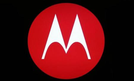 © Reuters/Jim Young. A Motorola Mobility logo is seen on a screen at the public unveiling of their global headquarters in Chicago on April 22, 2014.